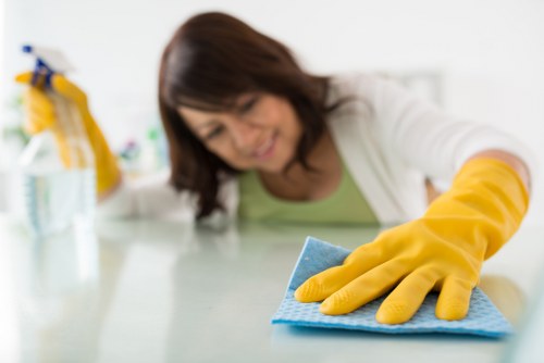 Careful cleaning of a residential building exterior in Finchley