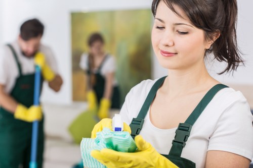 Local cleaner preparing a Finchley kitchen and living area for a thorough clean
