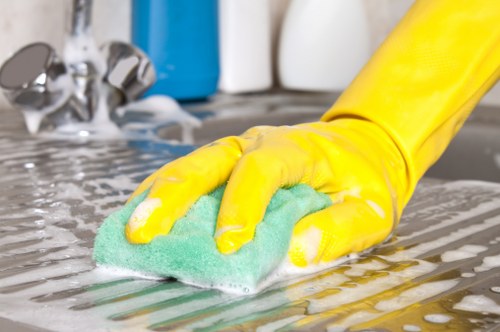 Local deep cleaning team working in a Finchley flat bathroom