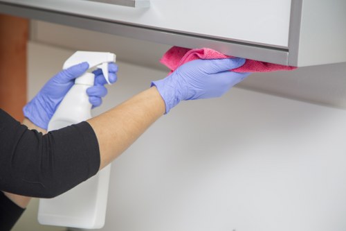 Cleaning team reviewing public liability insurance and safety procedures